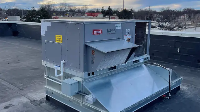 New Bryant Legacy packaged rooftop unit installed on a commercial roof